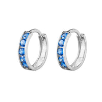A pair of sterling silver cage hoop earrings with blue sapphire stones - seolgold