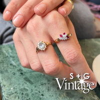 Vintage 9ct Solid Gold Aquamarine CZ Ring on a hand - seolgold