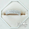 Silver ring with diamonds on a white hexagonal stand, featuring 'S + G Vintage' branding - seolgold