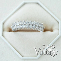 Silver ring with diamonds on a white hexagonal stand, featuring 'S + G Vintage' branding - seolgold