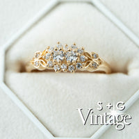 Gold ring with diamonds in a hexagonal box, featuring 'S + G Vintage' branding - seolgold