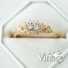 Gold ring with diamonds on a white background, featuring 'S + G Vintage' branding - seolgold