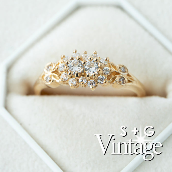 Gold ring with diamonds on a white background, featuring 'S + G Vintage' branding - seolgold