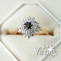 Vintage-style diamond ring with a black gemstone in a hexagonal box, featuring the brand 'S + G Vintage' - seolgold