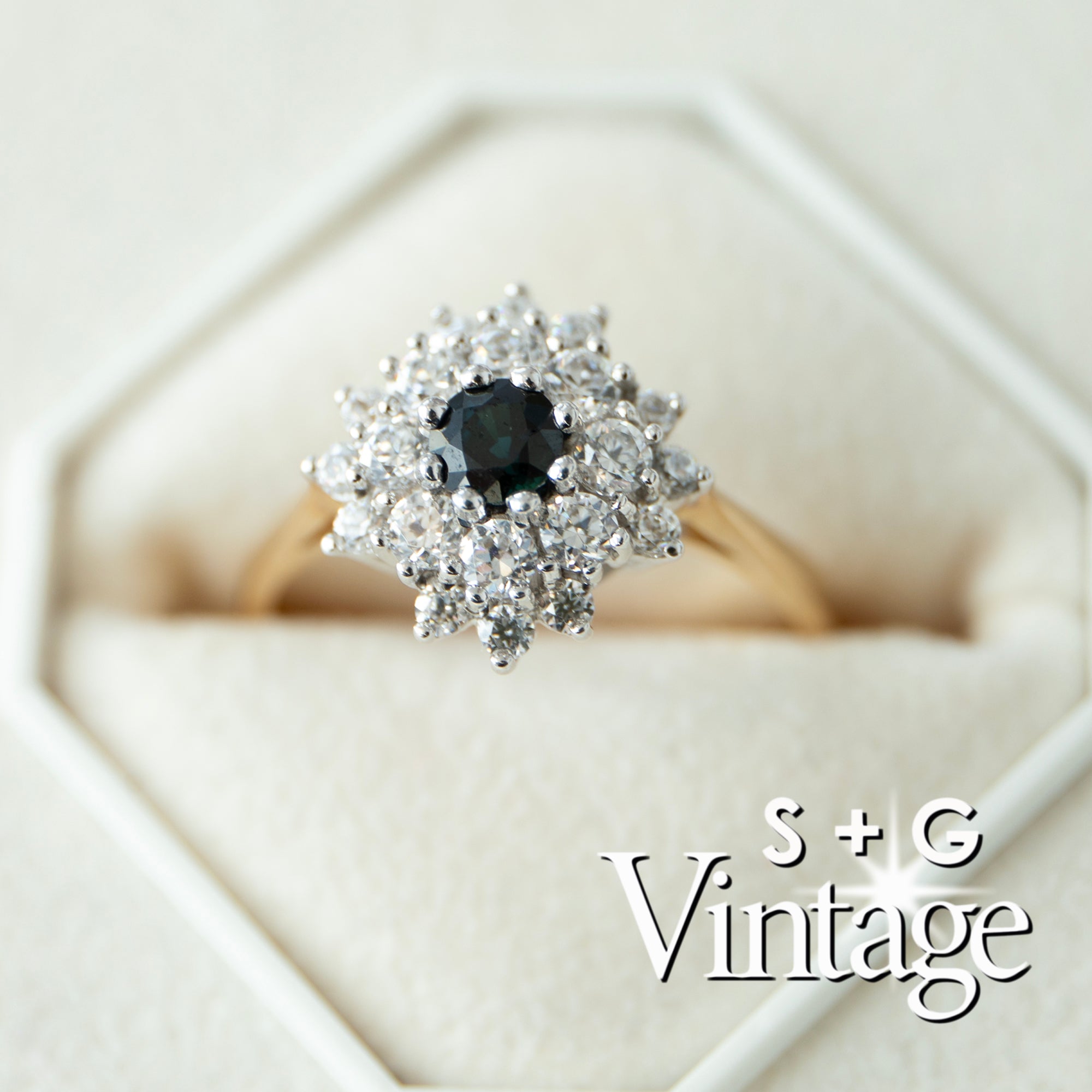 Diamond ring with a black gemstone in a hexagonal box, featuring 'S + G Vintage' branding - seolgold