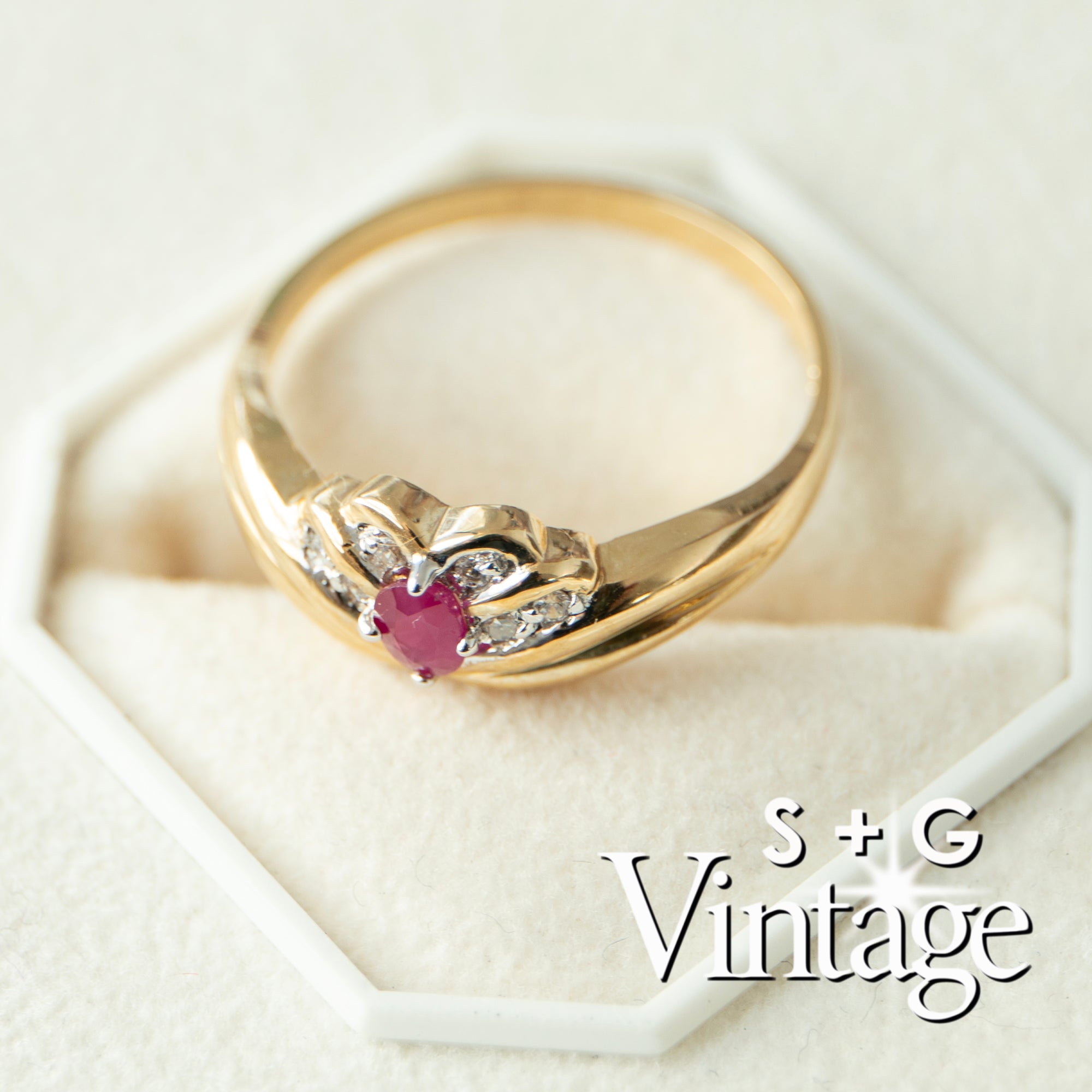 Gold ring with a heart-shaped gemstone in a white box, branded 'S + G Vintage' - seolgold