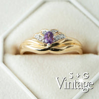 Gold ring with a purple gemstone and diamonds in a box, branded 'S + G Vintage' - seolgold