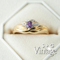 Gold ring with a purple gemstone in a hexagonal box, branded 'S + G Vintage' - seolgold