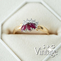 Gold ring with red gemstones and diamonds in a box, branded 'S + G Vintage' - seolgold