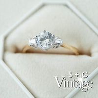 Diamond ring with gold band on a white hexagonal stone, featuring 'S + G Vintage' branding - seolgold