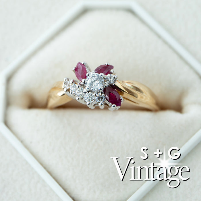 Gold ring with red gemstones and diamonds in a hexagonal box, branded 'S + G Vintage' - seolgold