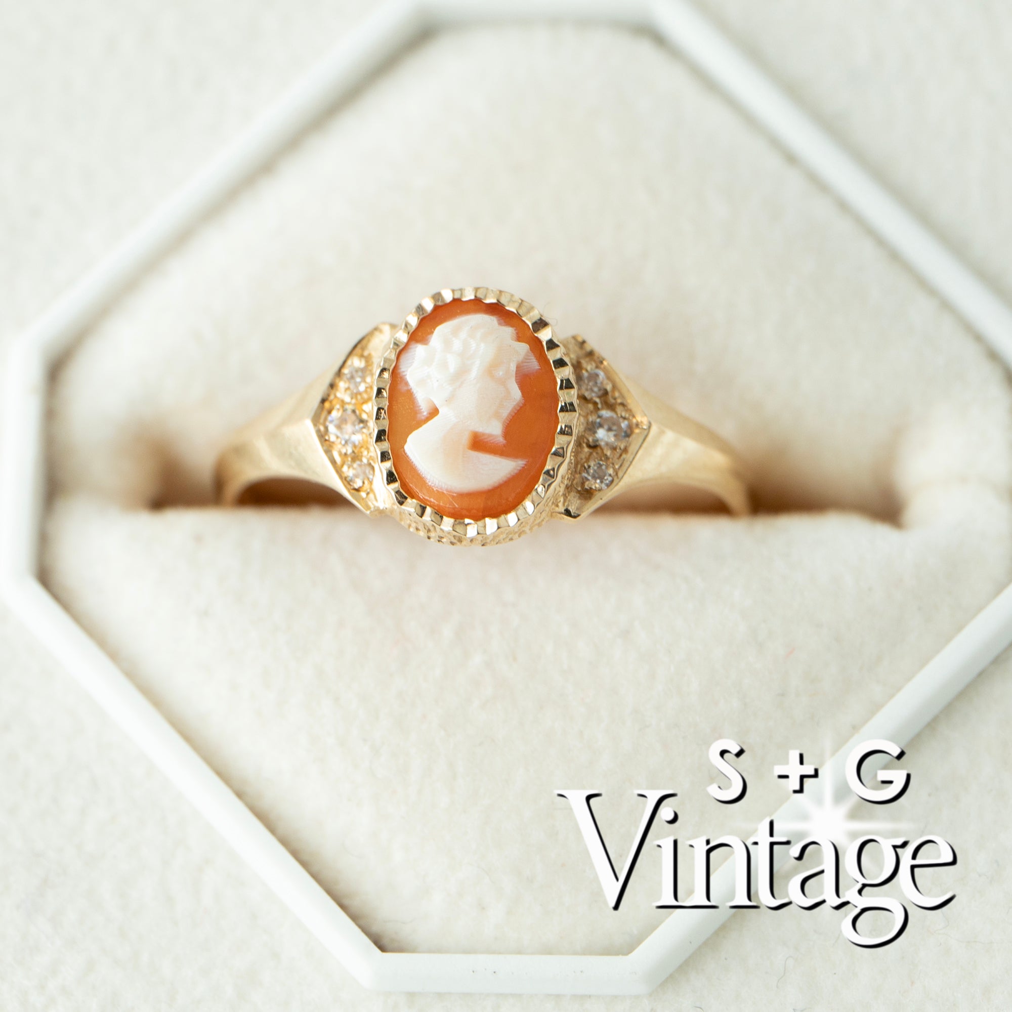 Vintage-style ring with a cameo design in a hexagonal box, featuring the brand 'S + G Vintage' - seolgold