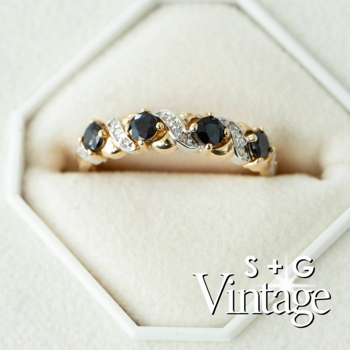 Gold ring with black gemstones on a white background, featuring 'S + G Vintage' branding - seolgold