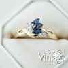 Gold ring with blue gemstones and diamonds on a white background, featuring 'S + G Vintage' branding - seolgold