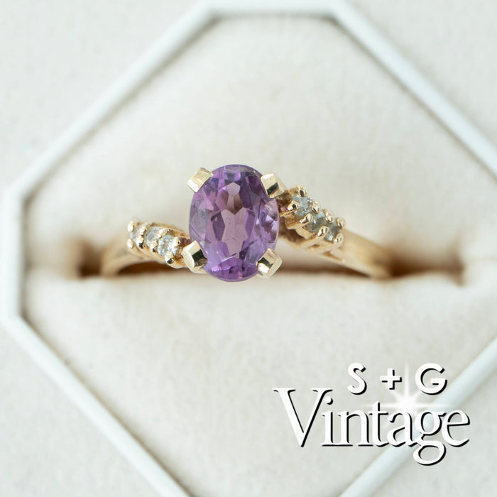 Gold ring with a purple gemstone and small diamonds in a hexagonal box, branded 'S + G Vintage' - seolgold