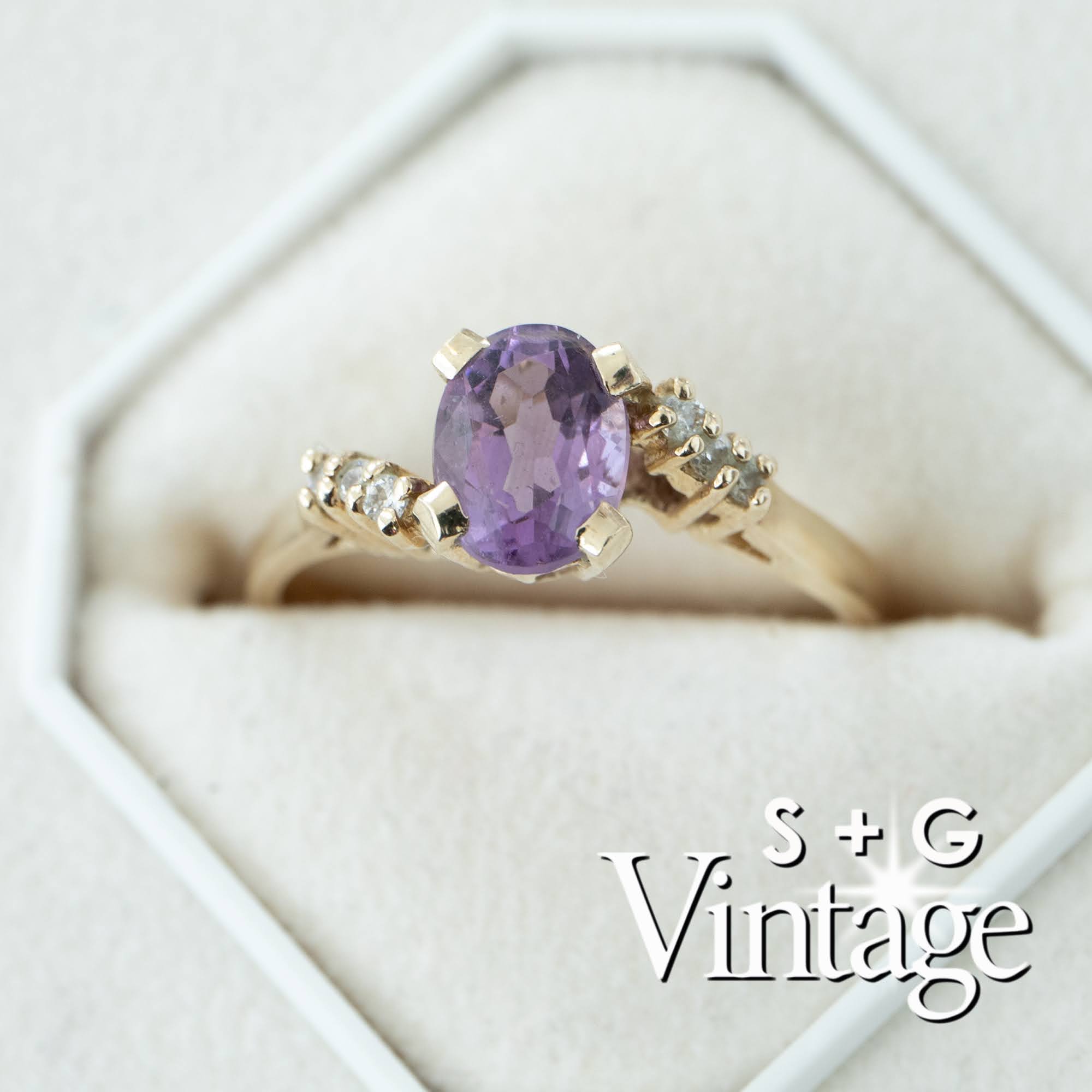 Gold ring with a purple gemstone in a hexagonal box, branded 'S + G Vintage' - seolgold