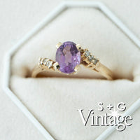 Gold ring with a purple gemstone in a hexagonal box, branded 'S + G Vintage' - seolgold